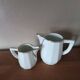 2 white porcelain milk jugs with platinum trim, Flora by Apilco.