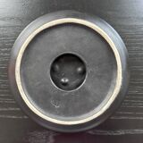 Designer ceramic pocket emptier