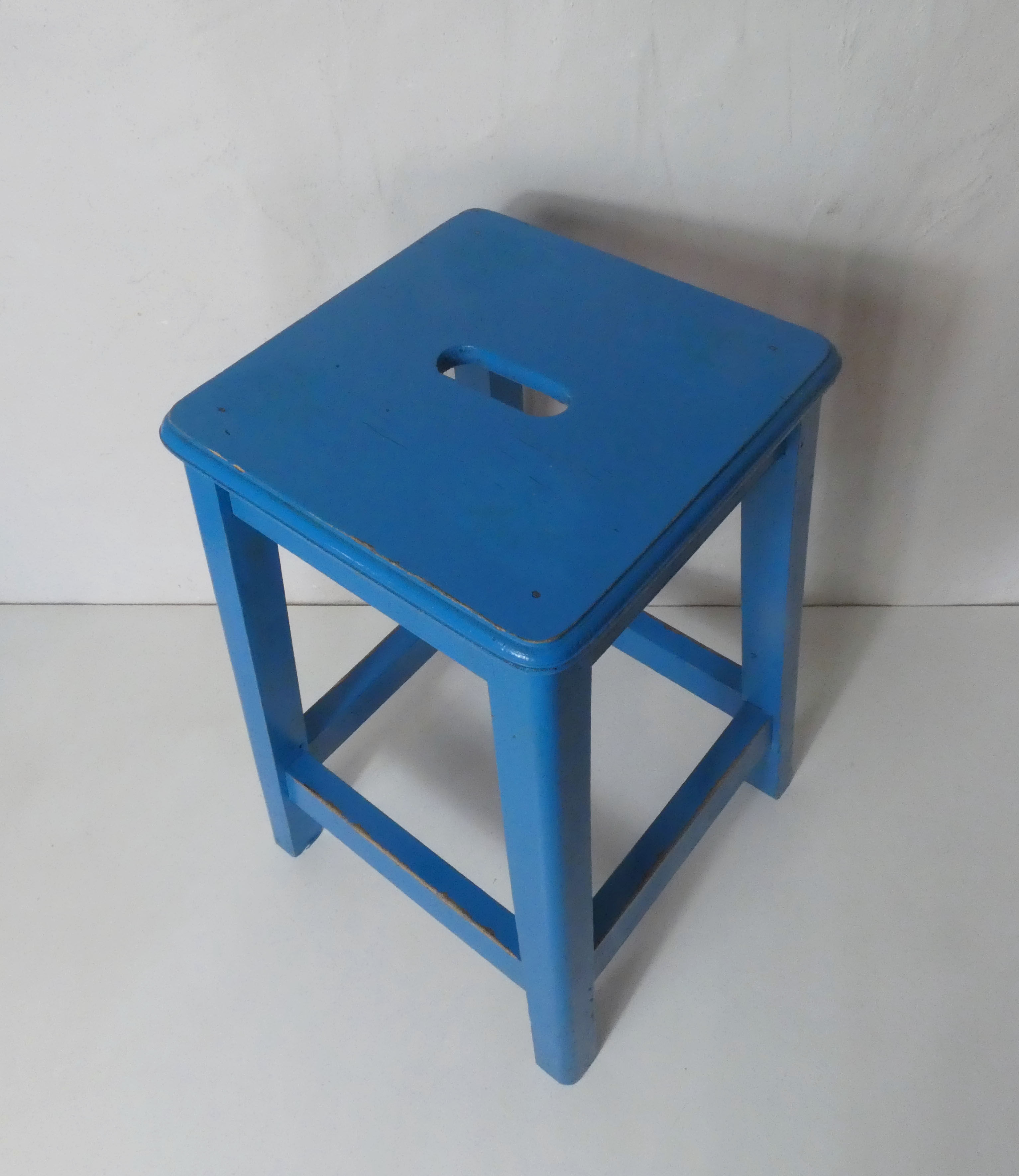Painted wooden workshop stool