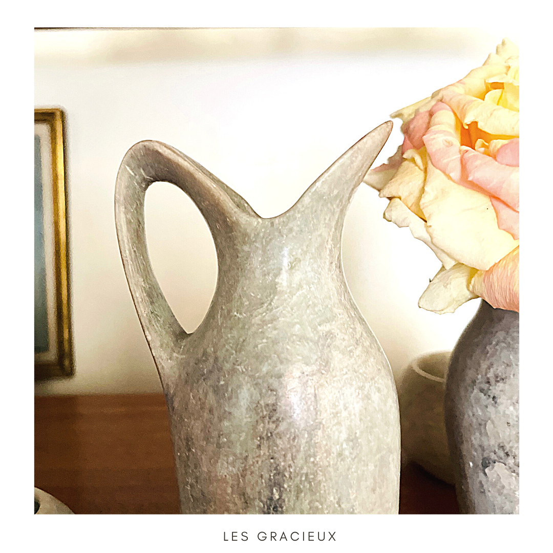 2 jugs in rough cut stone