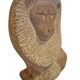 Sculpture of a lion in stone by Islay Grimes.