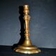 Antique candle holder, carved in bronze, 18th century.