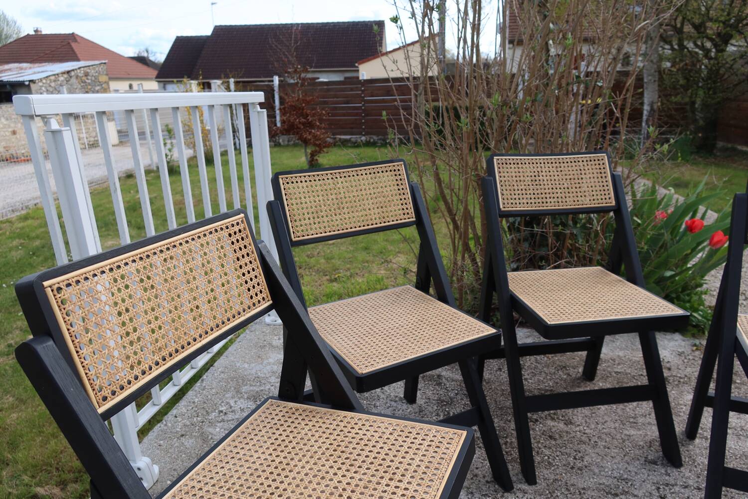 4 chaises pliantes en rotin et bois noir par H&M