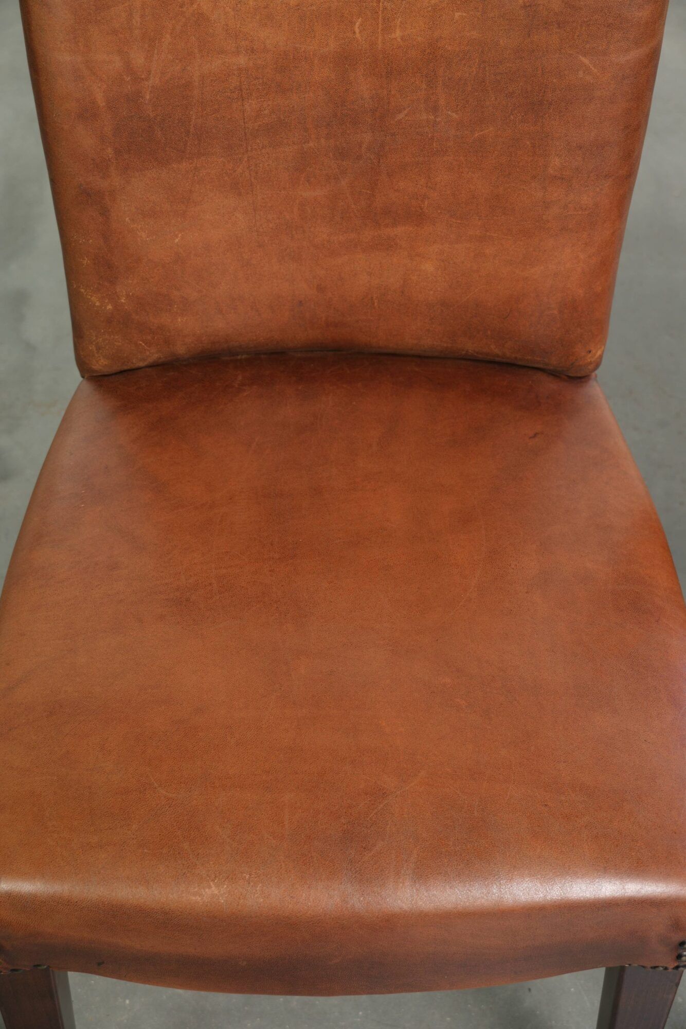Set of 6 sheepskin dining chairs in a cognac colour with a lovely patina