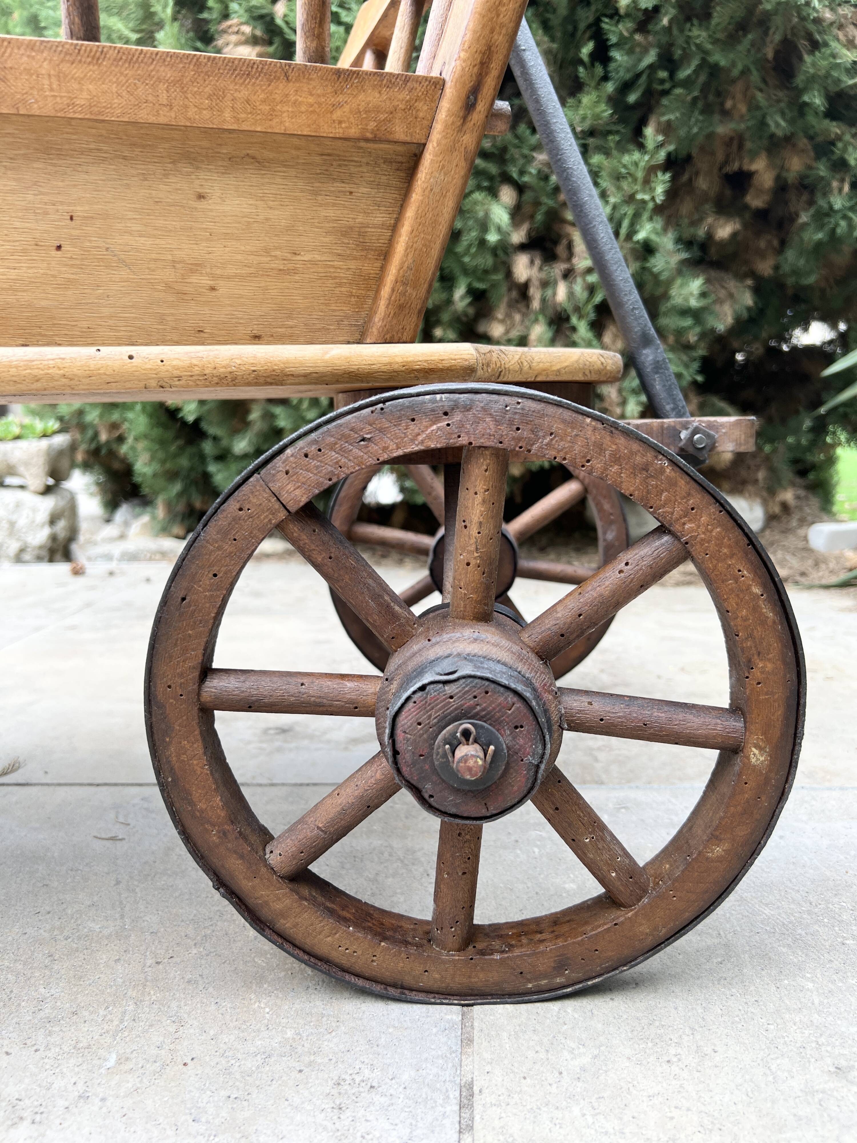 19th century cart in wood and wrought iron, garden cart, storage