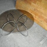 Vintage tubular coffee table in chrome with a transparent glass top, Mid-Century style 1960s.