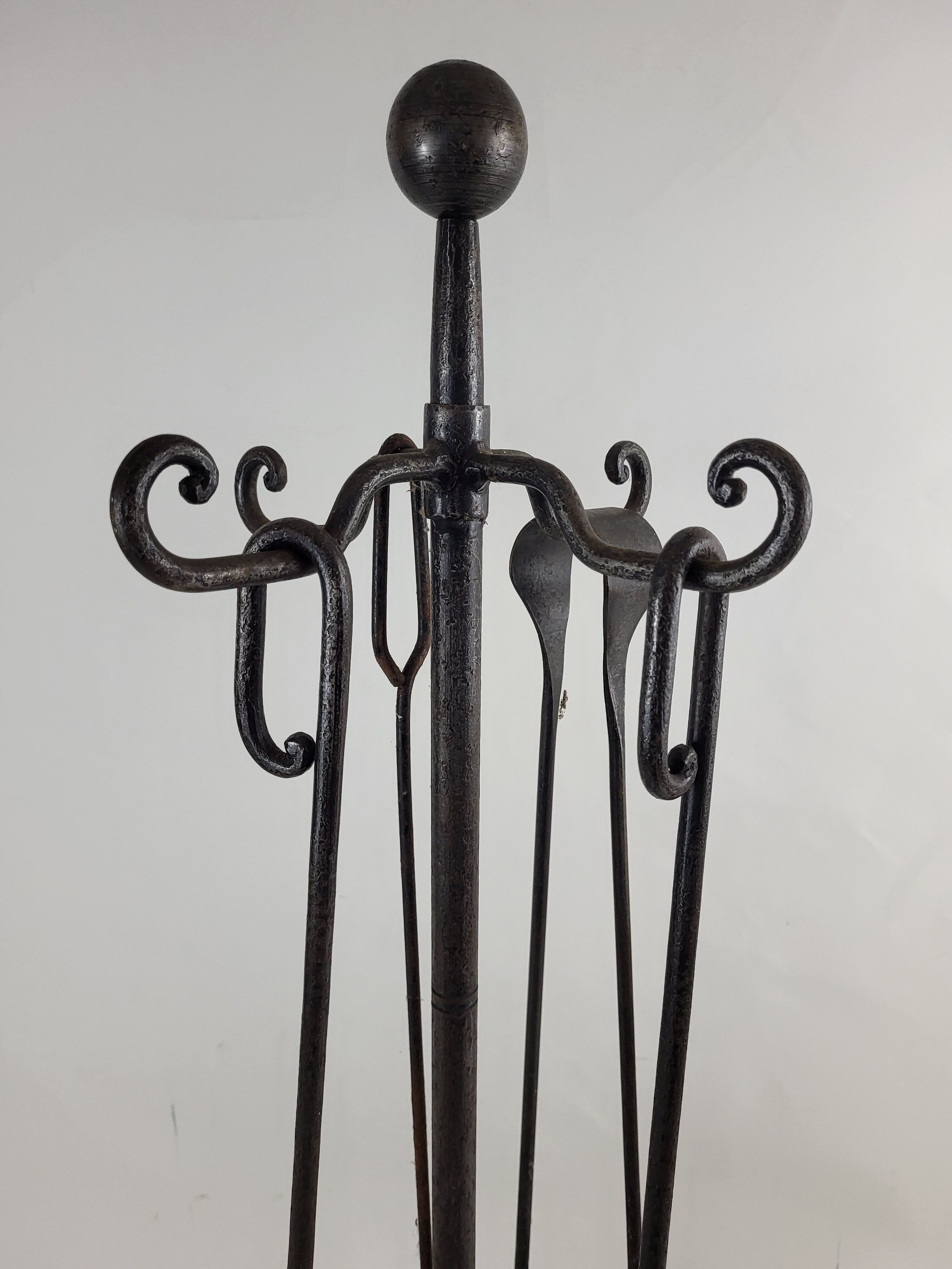 Wrought iron fireplace servant