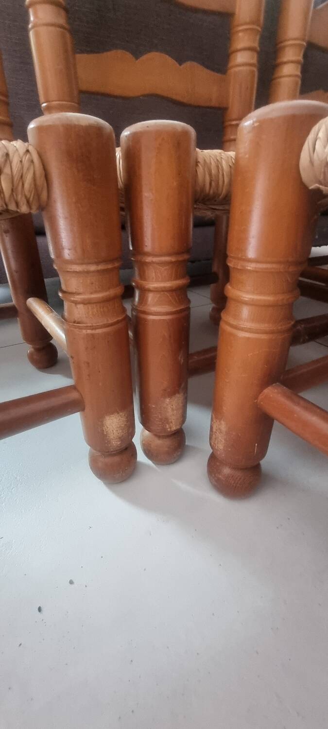 4 chairs and stools, brutalist art, straw and wood