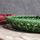 Two woven ceramic fruit baskets/centerpieces