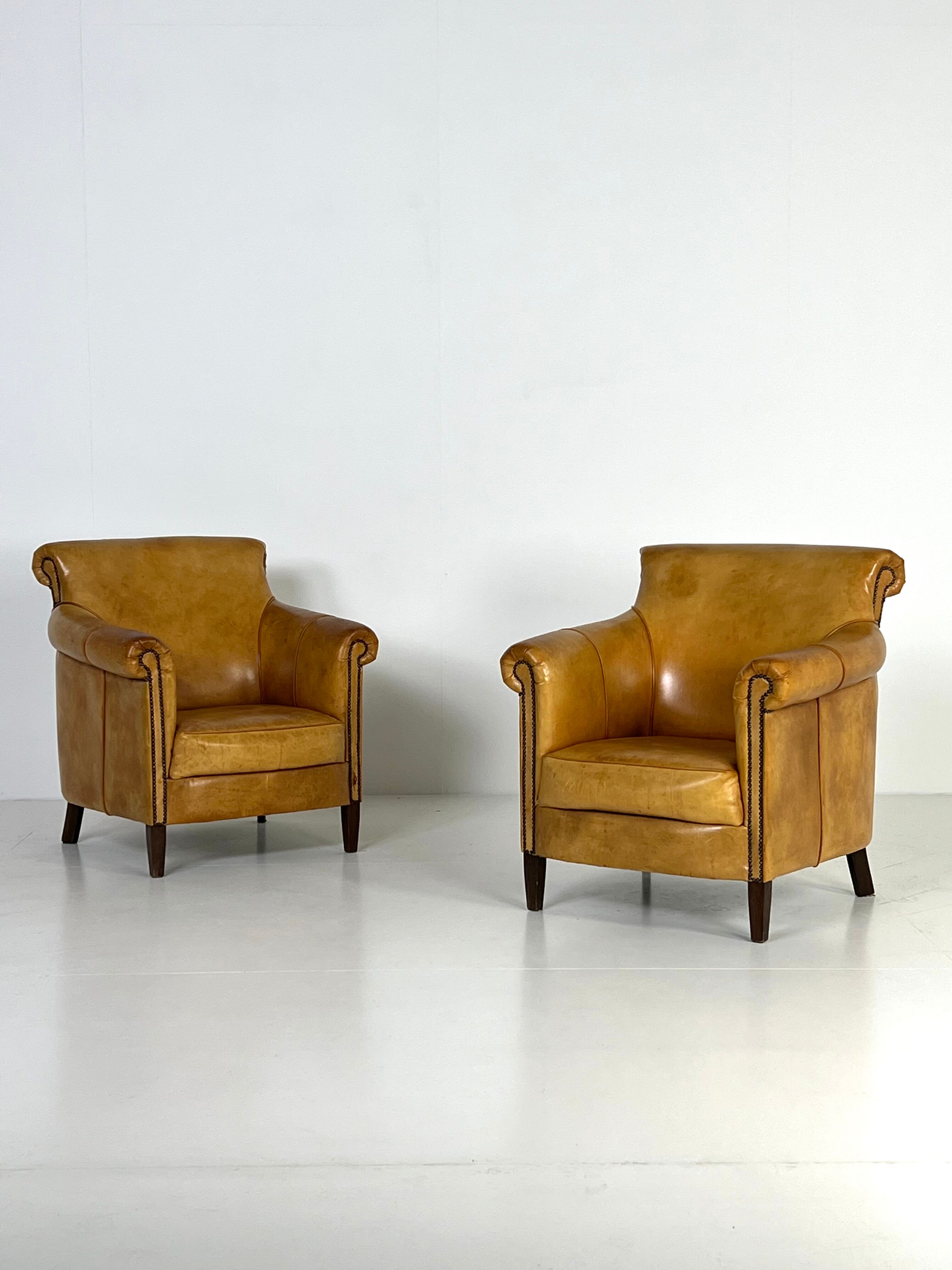 Ensemble de 2 fauteuils club en cuir
