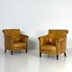 Ensemble de 2 fauteuils club en cuir