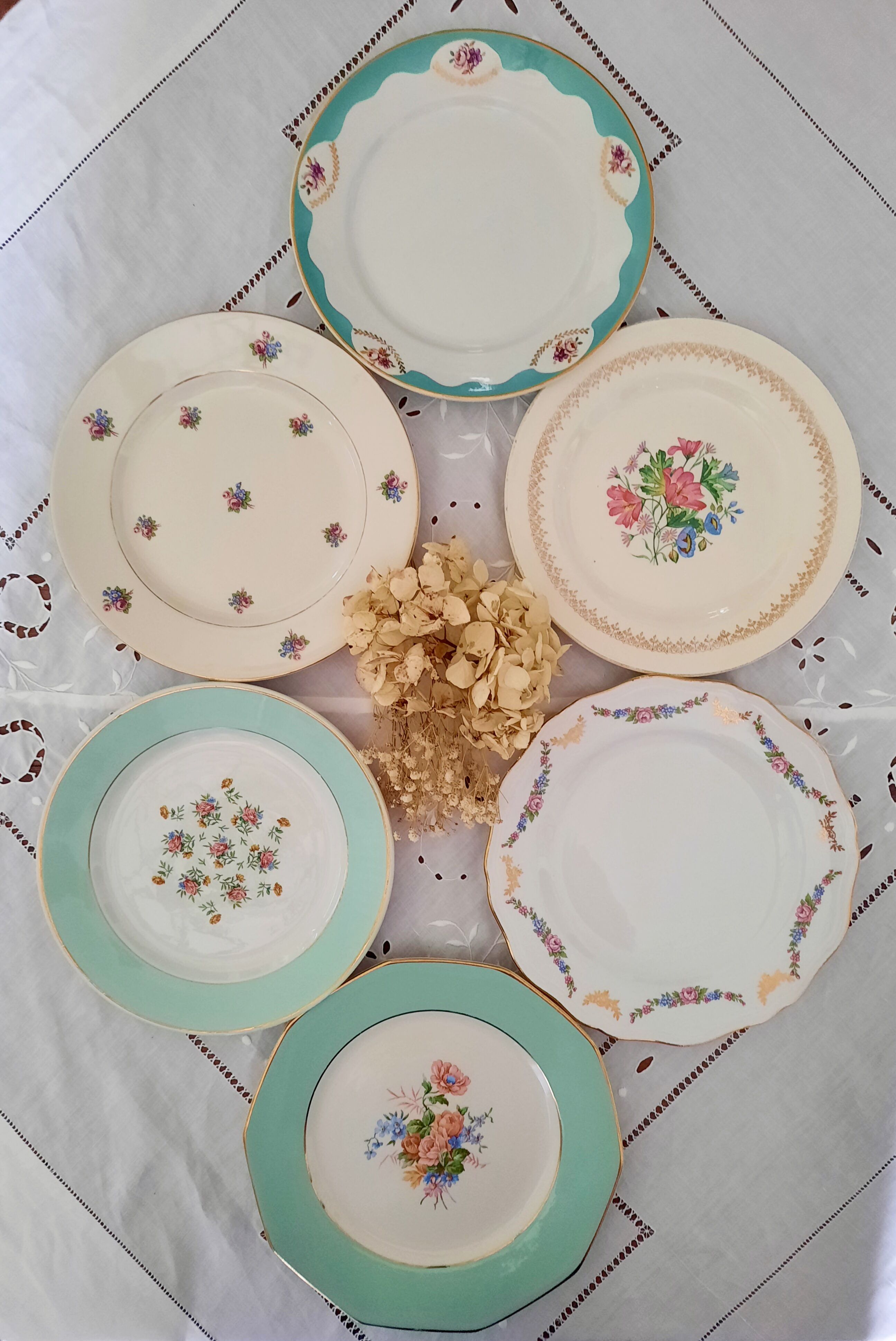 Mismatched old flat plates with gold