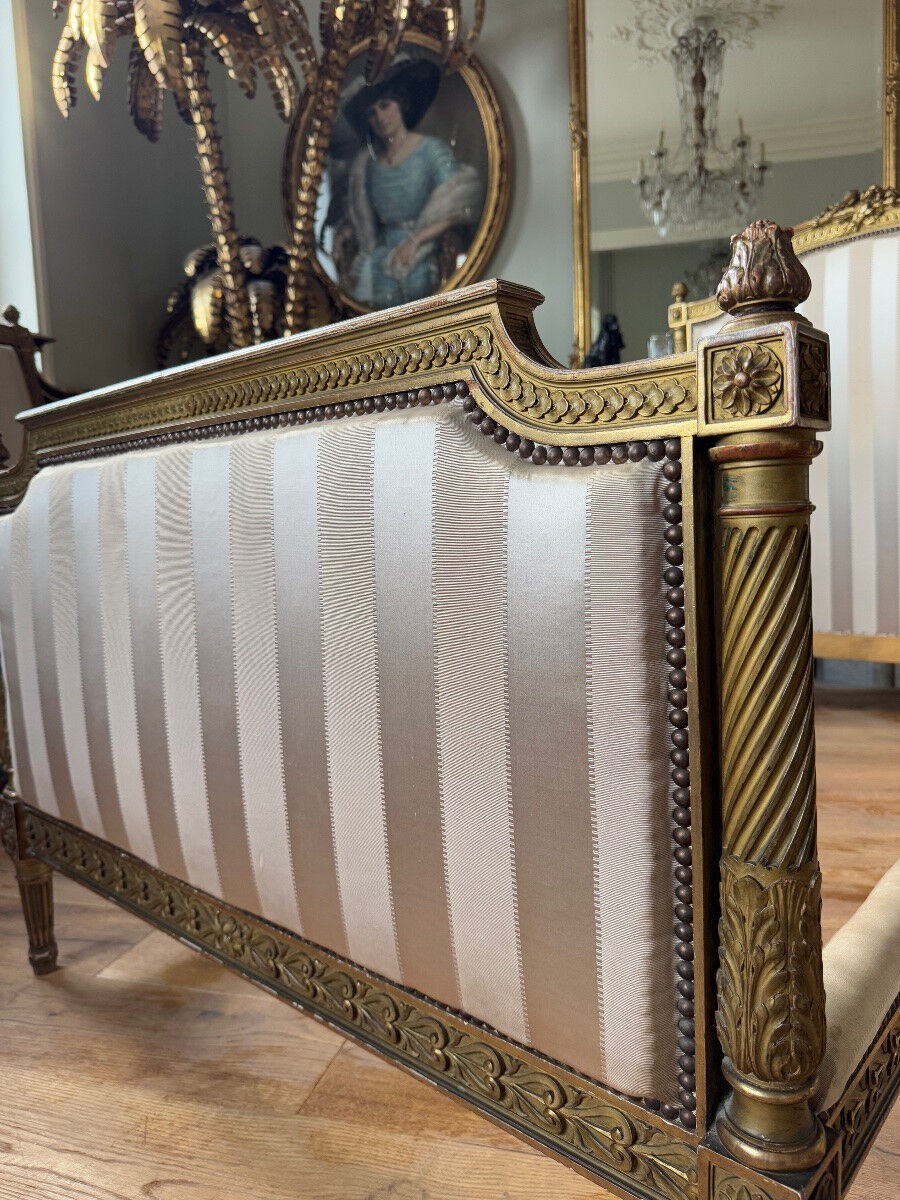 Pair of late 19th-century gilded wooden beds in Louis XVI style.