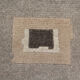 Handwoven matt cream wool carpet 61x91 cm