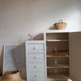Old white asymmetrical chest of drawers