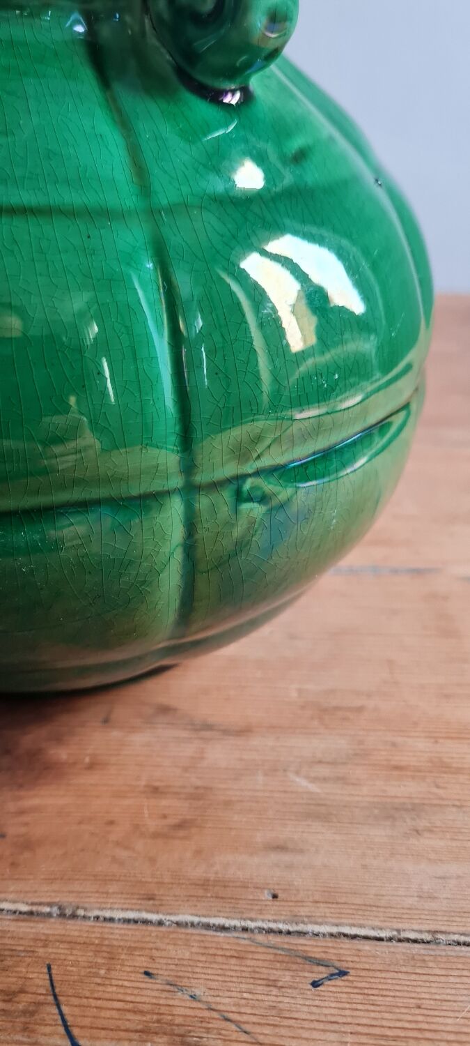 Green glazed earthenware vase