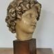 Wax head on “art deco” wooden base