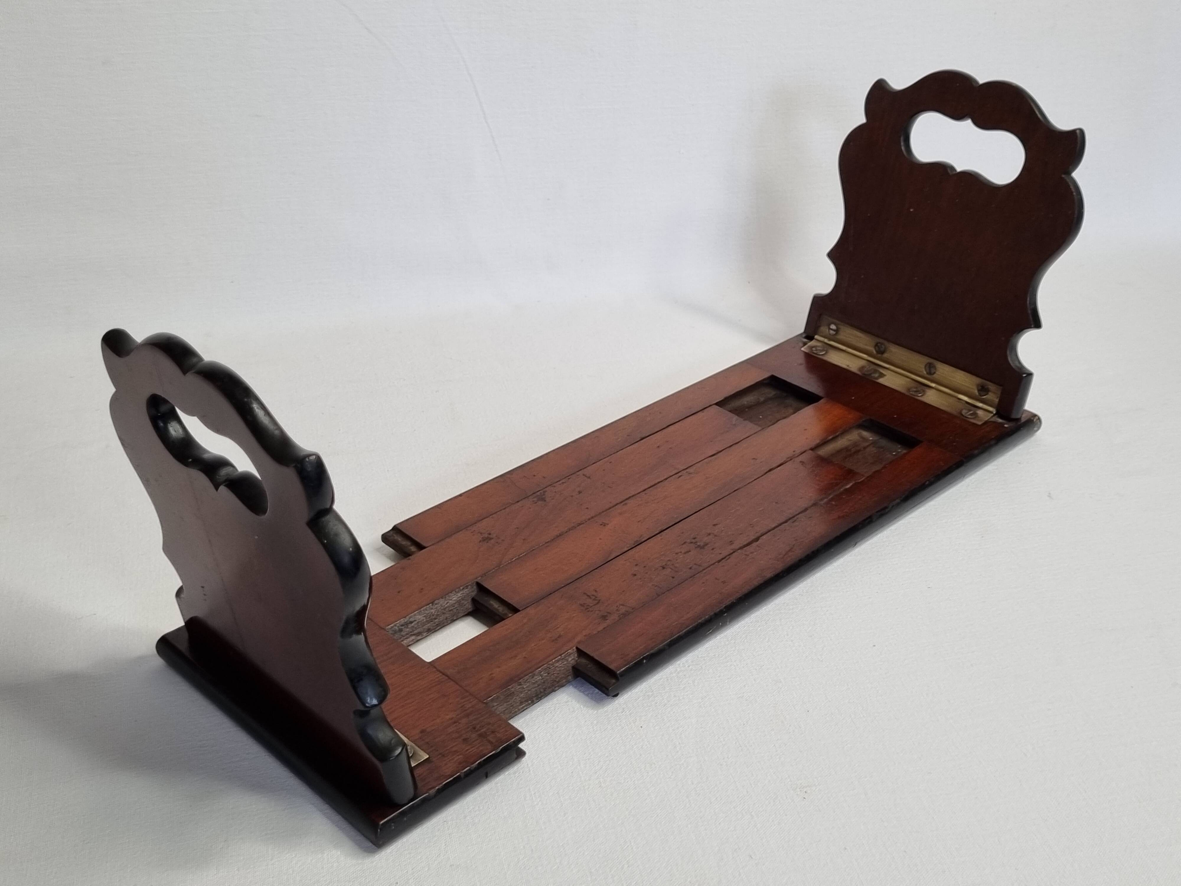 Solid wood zippered bookend, folding, 1900