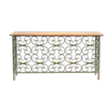 The wrought iron radiator cover