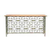 The wrought iron radiator cover
