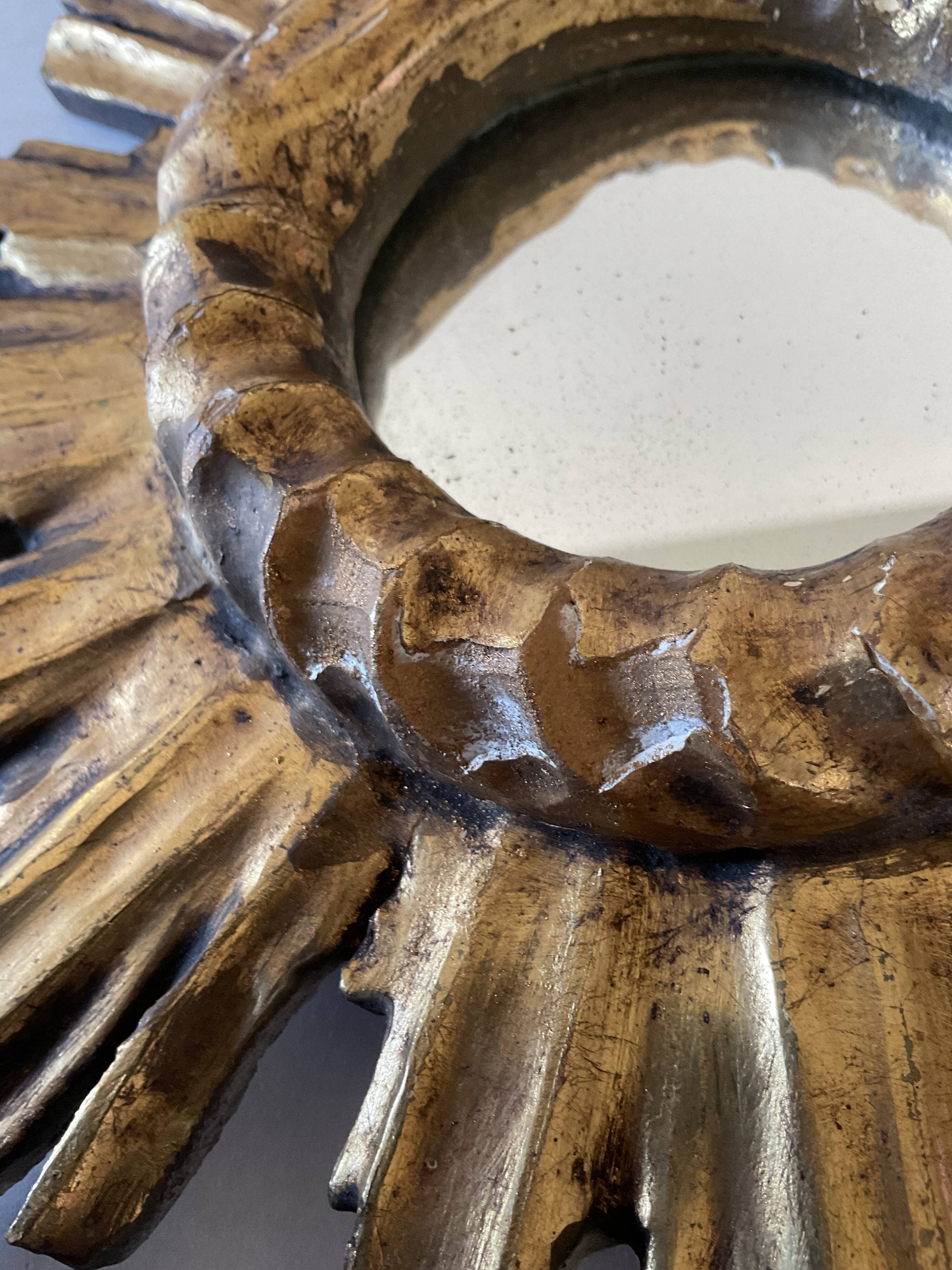Miroir soleil vintage en bois doré