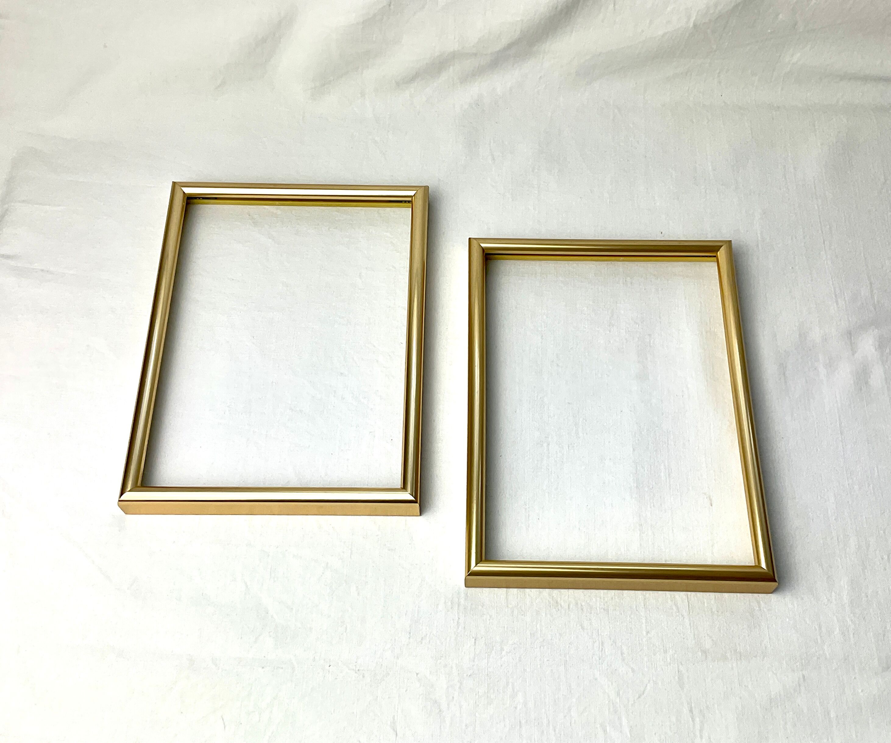 Pair of golden frames. Hama