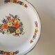 Digoin round dish, basket of flowers