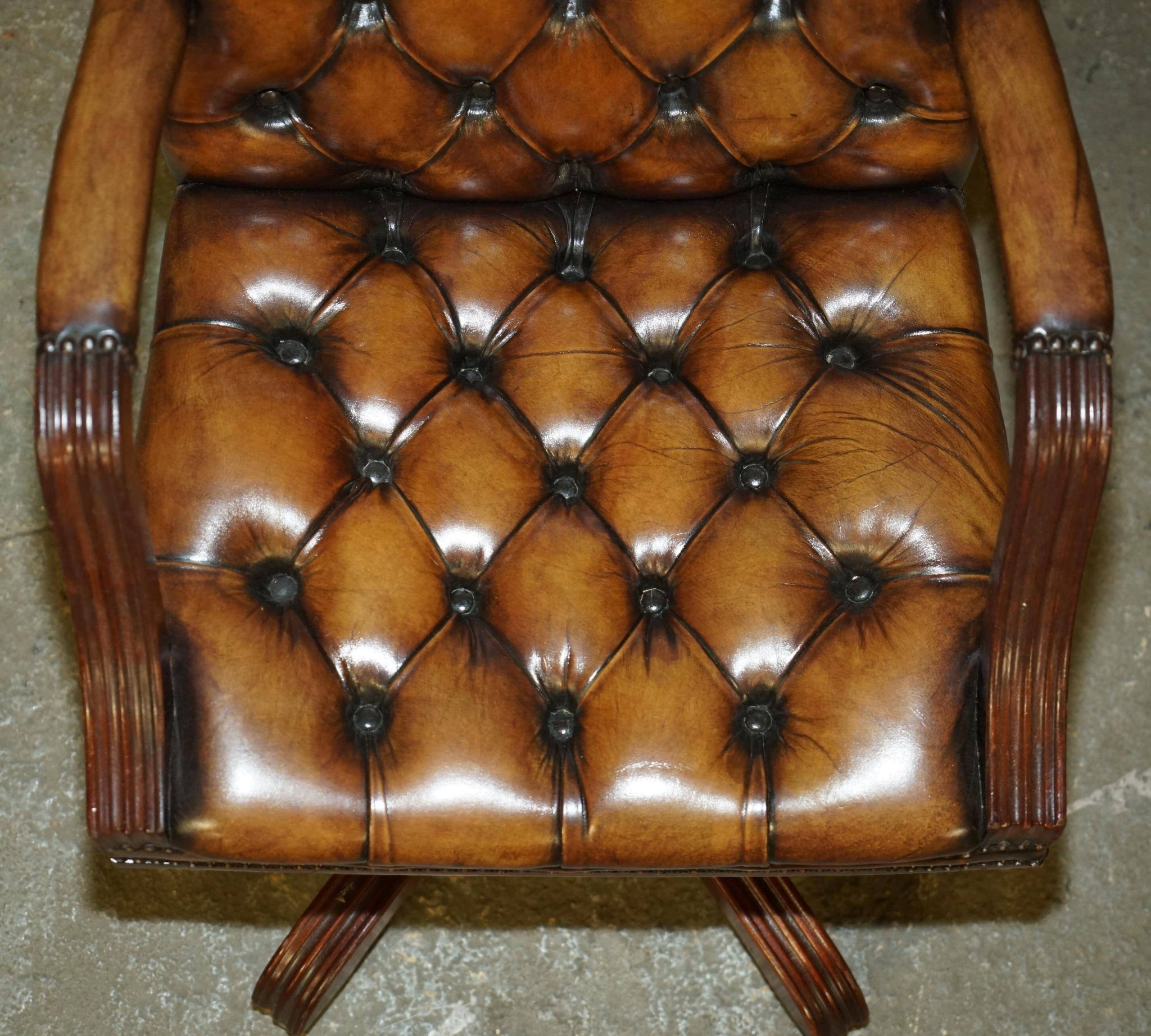 Restored leather captain's Chesterfield chair