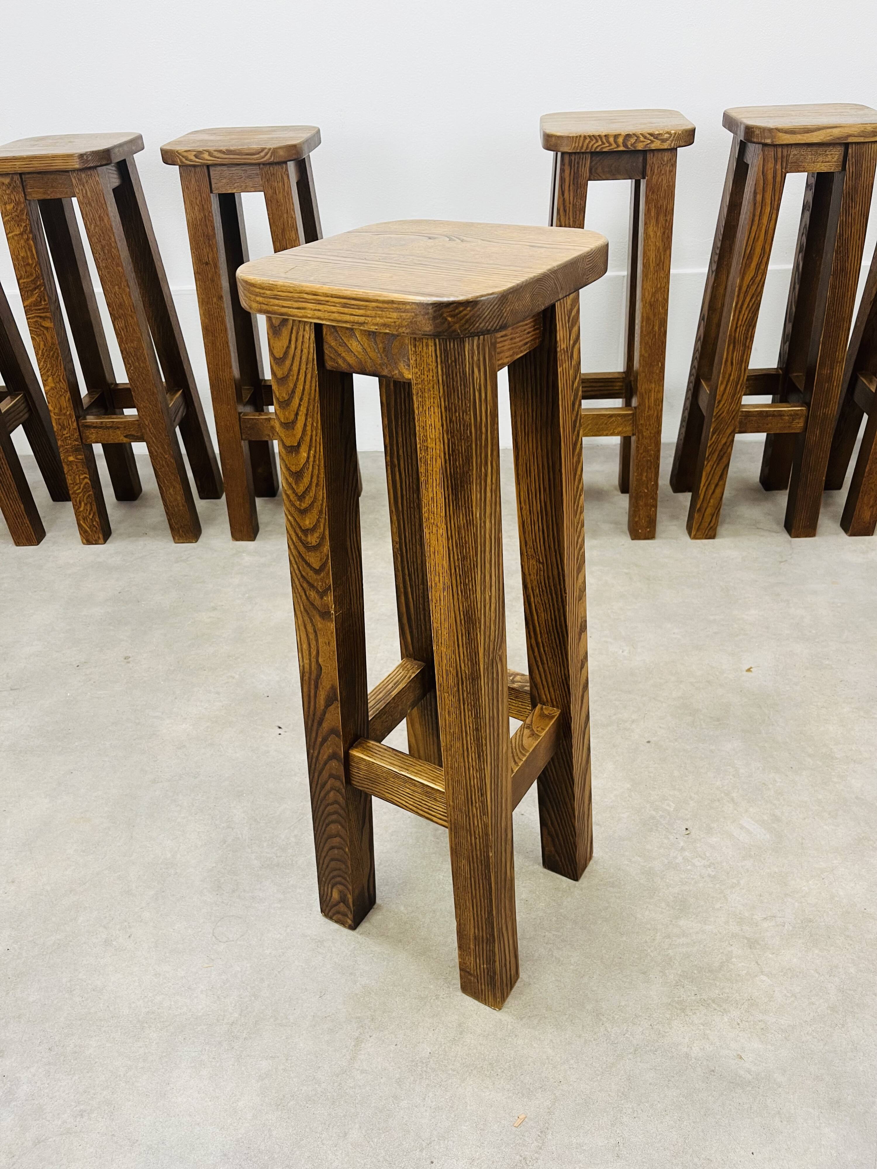 8 solid wood bar stools in brutalist style