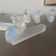 9 doors art deco knives in opalescent glass, bestiary.