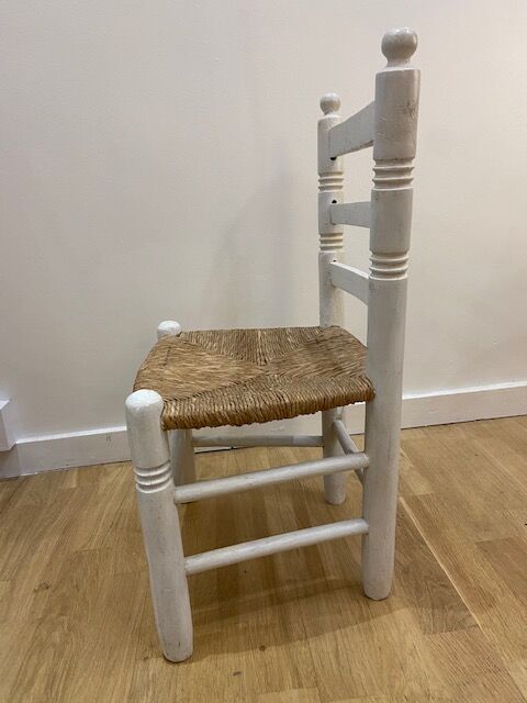 White wooden child chair