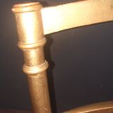 Pair of upholstered chairs in gilded wood