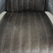 Cow leather aviator design armchair finished with aluminium and rivets