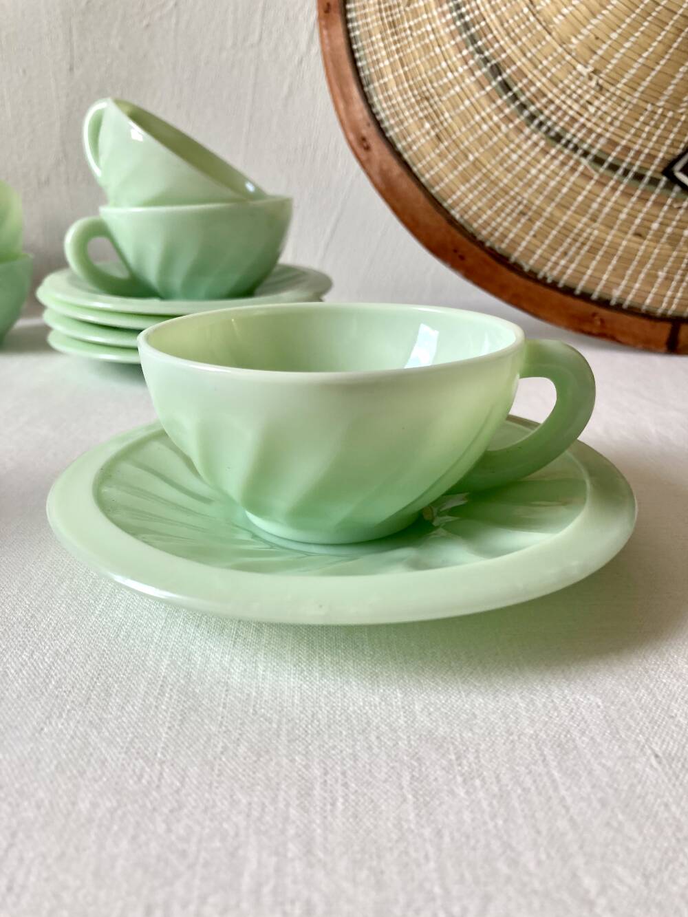 Pressed glass cups and saucers, 1950s