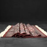 Handwoven red Boukhara oriental rug, 1960s