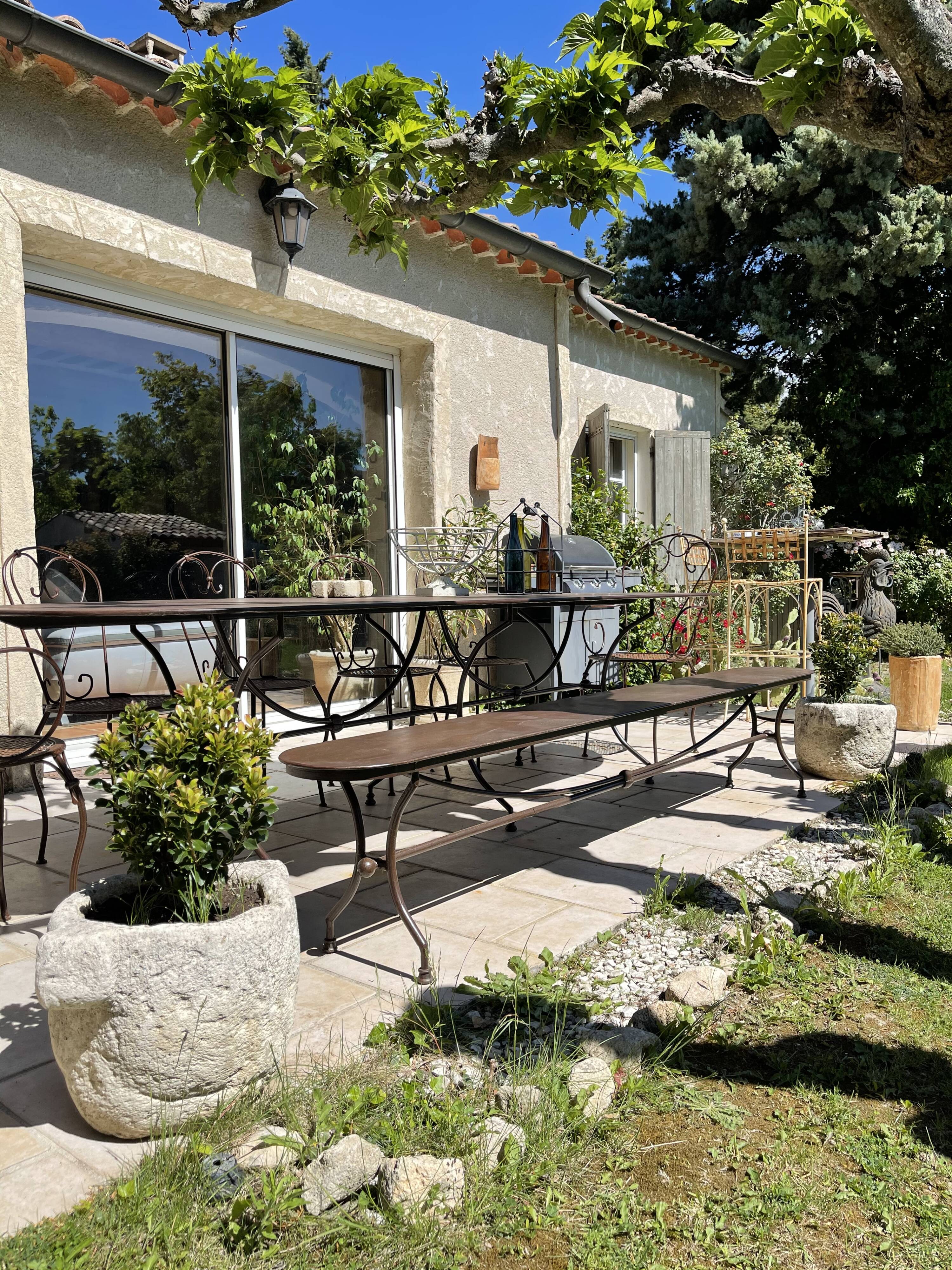 Artisanal wrought iron garden bench