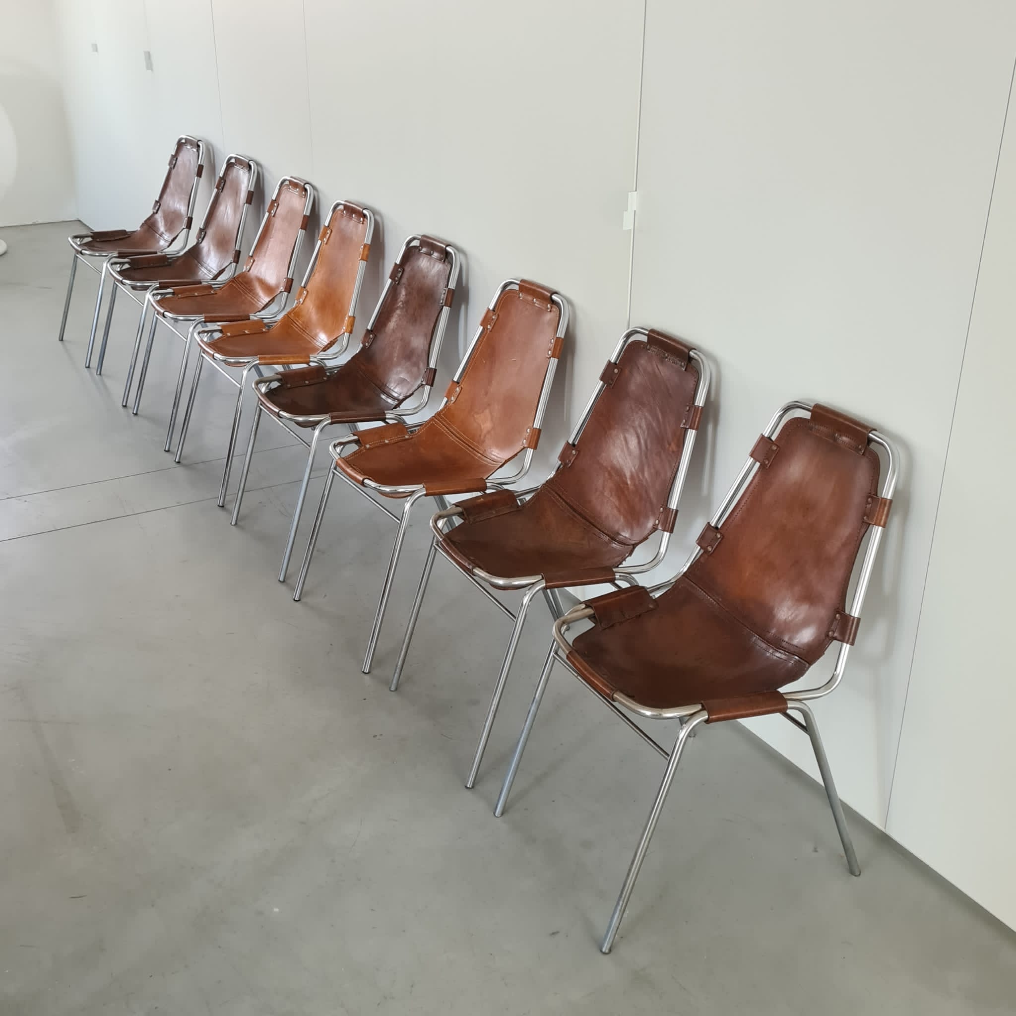 Set of eight mid-century leather dining chairs
