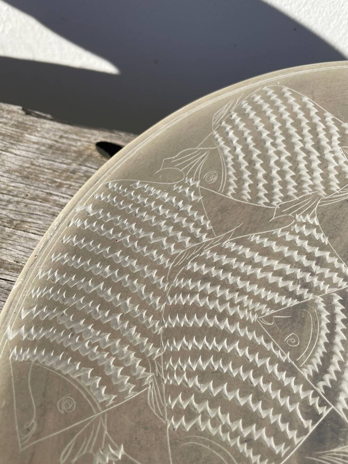 Ethnic handmade round fish dish