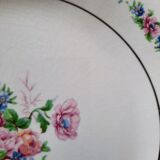 7 mismatched antique dessert plates accompanied by a pie dish