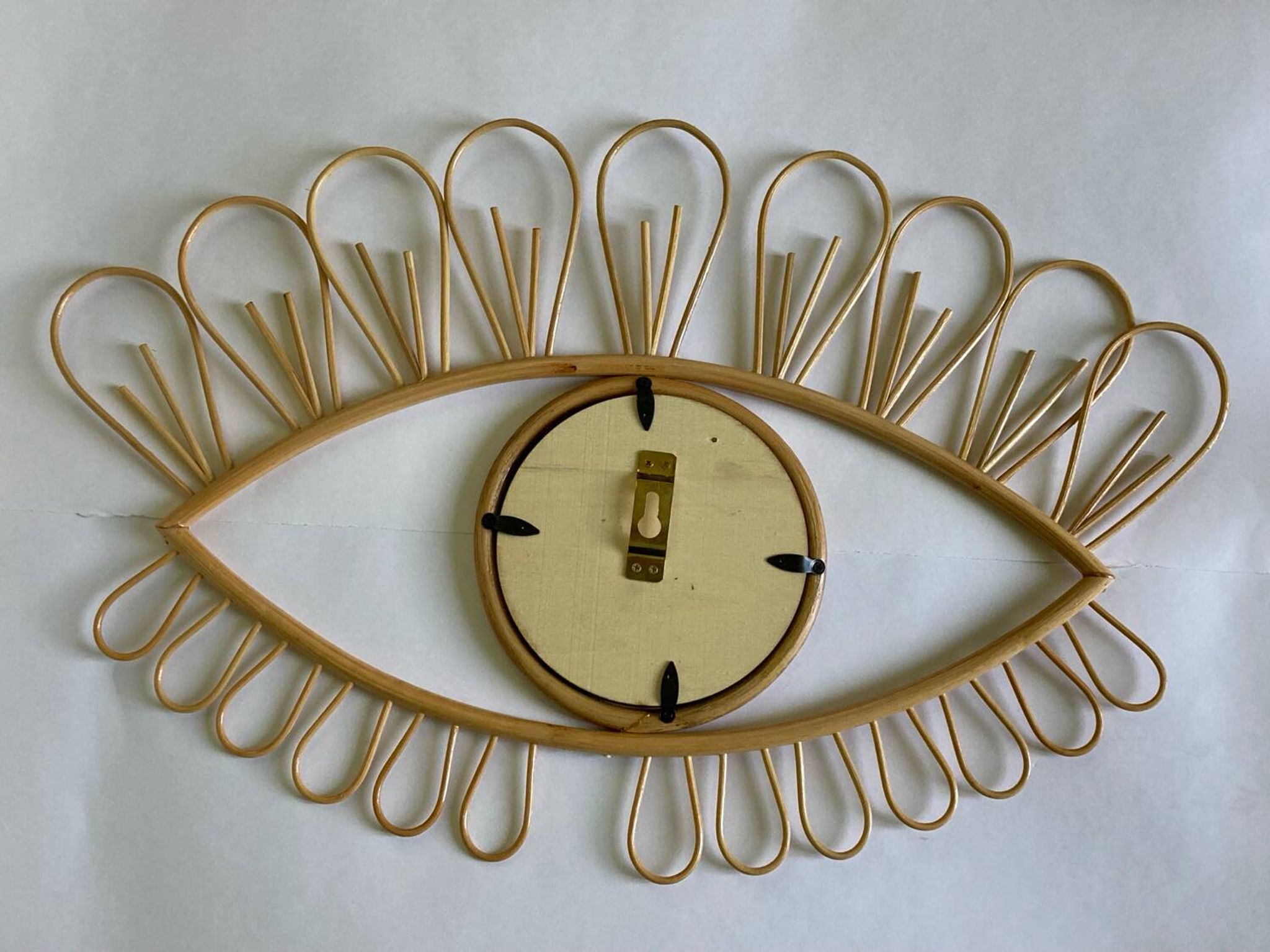 Rattan eye mirror