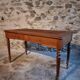 Antique French writing desk in oak with two drawers, 1920s.