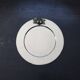 Vintage silver-plated round service tray with embossed cherries.