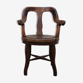 Antique oakwood barber armchair