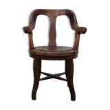 Antique oakwood barber armchair