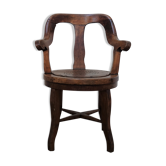 Antique oakwood barber armchair