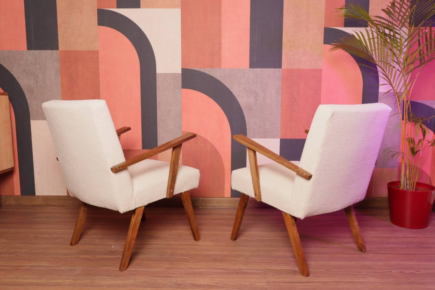 Vintage beige bouclé armchair with walnut wood from the 1950s.