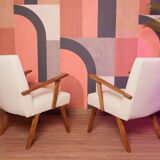 Vintage beige bouclé armchair with walnut wood from the 1950s.