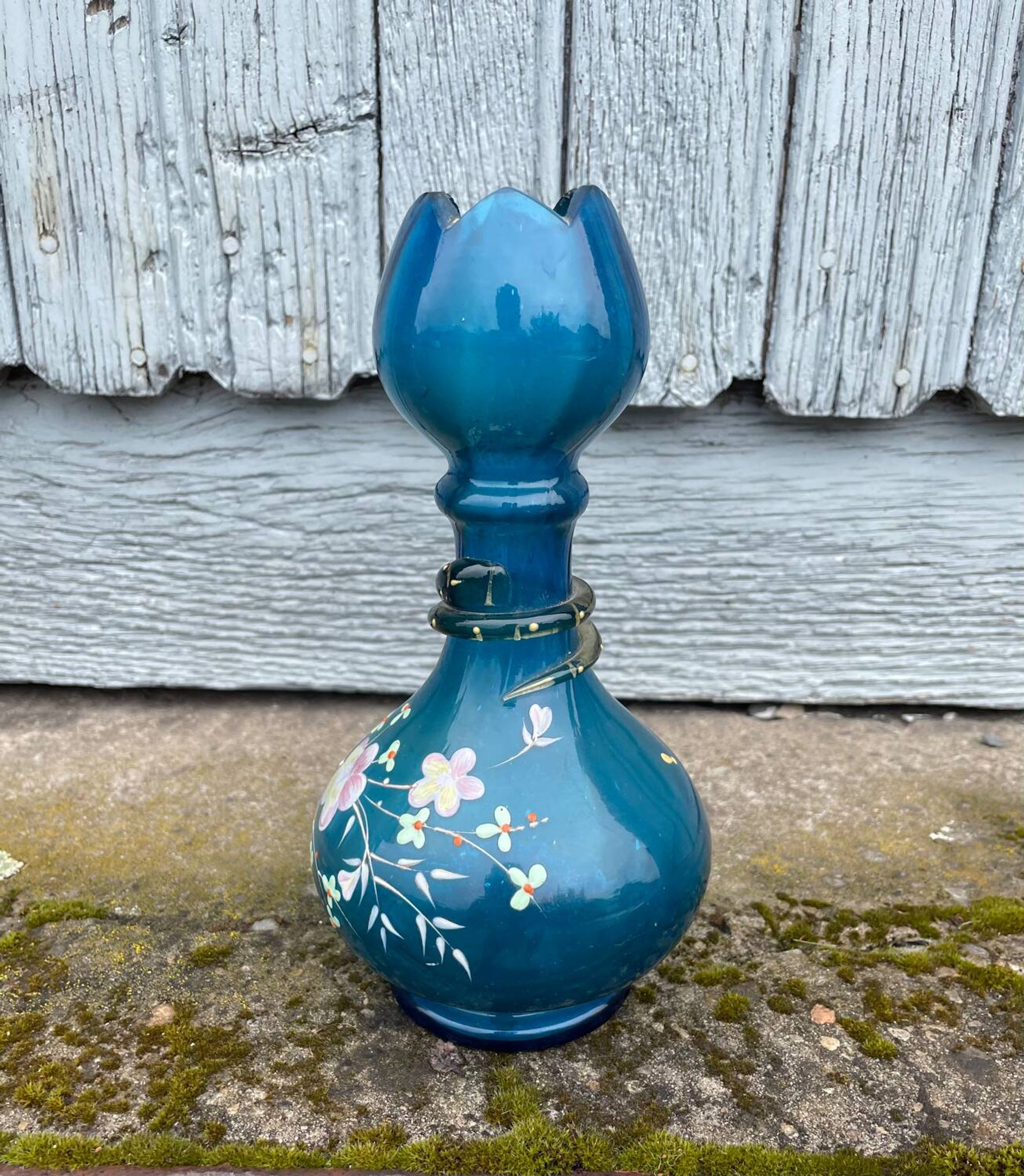vintage vase painted in satin blue