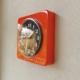 Vintage orange wall clock made of Inproco plastic, 1970