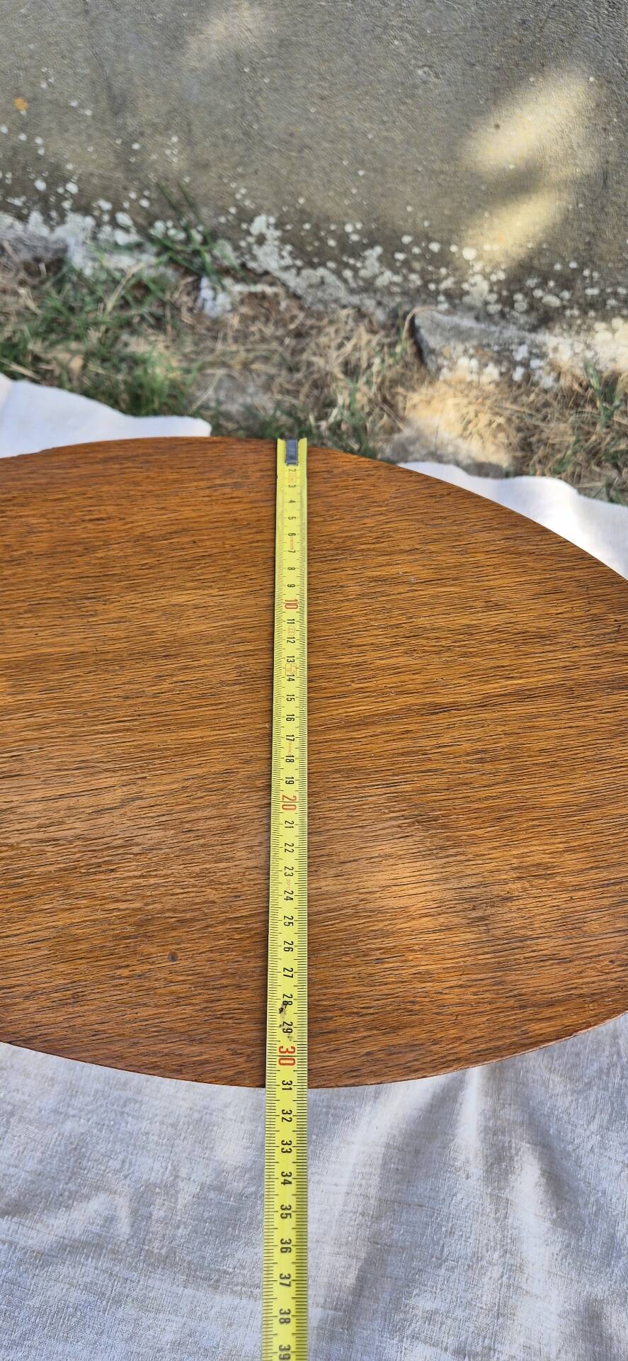 Vintage Scandinavian bean side table with wooden tapered legs.